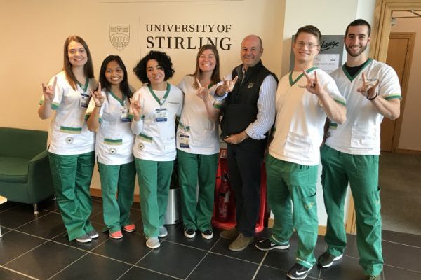 Stephen McGhee and students at University of Stirling